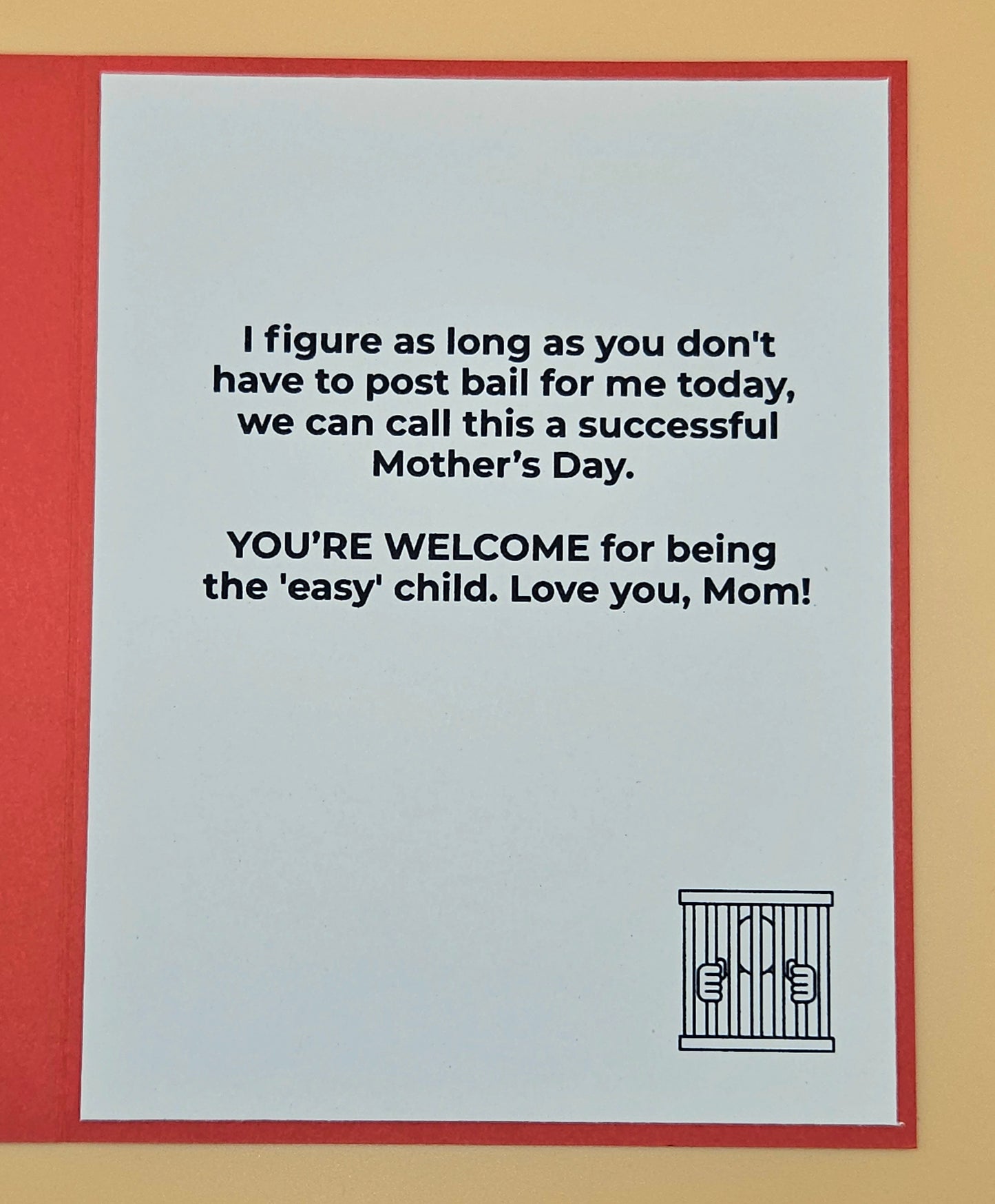 Card with humorous Mother's Day message and jail cell illustration on a red border.