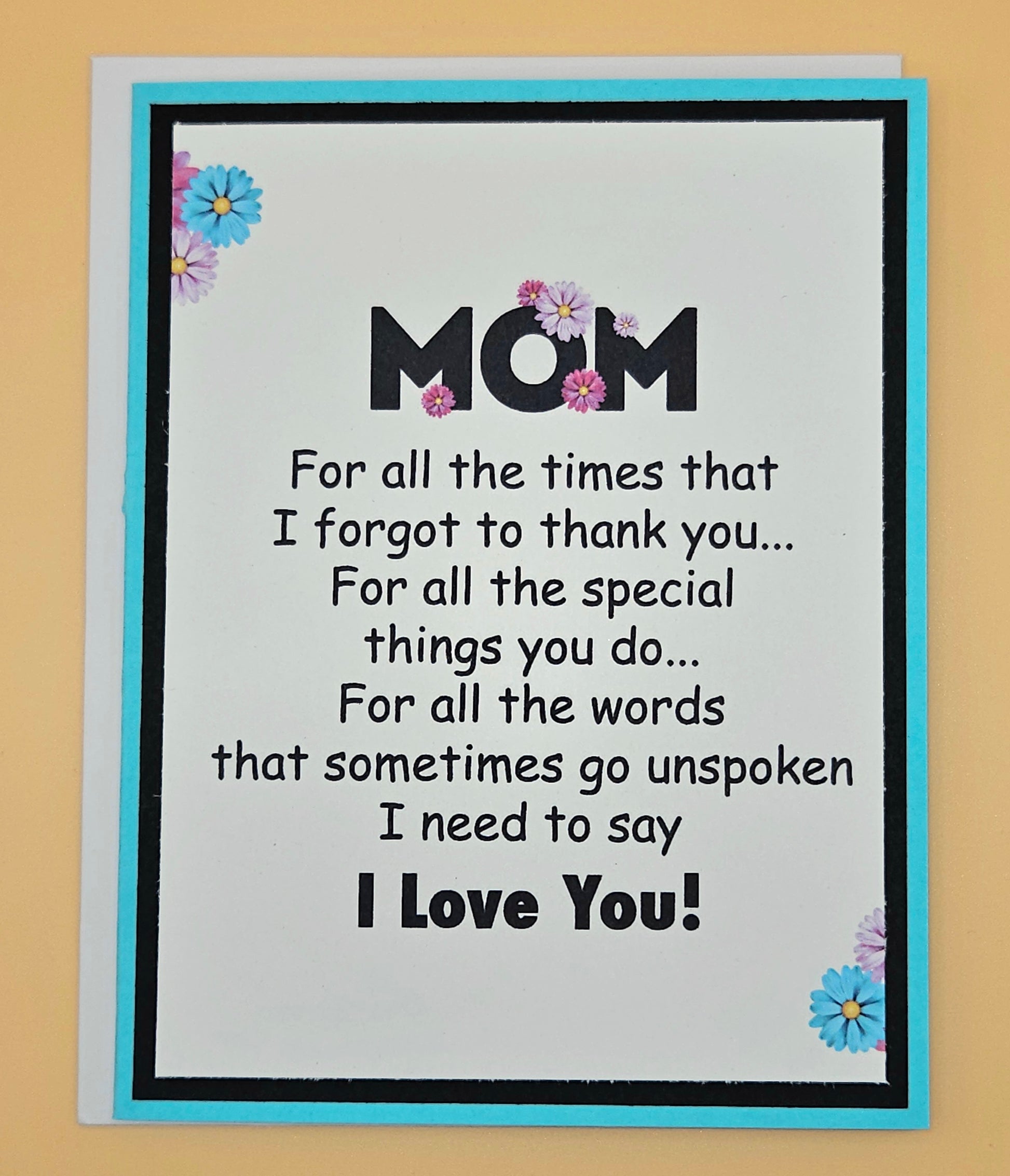 Greeting card for mom with floral decorations and heartfelt message on a beige background