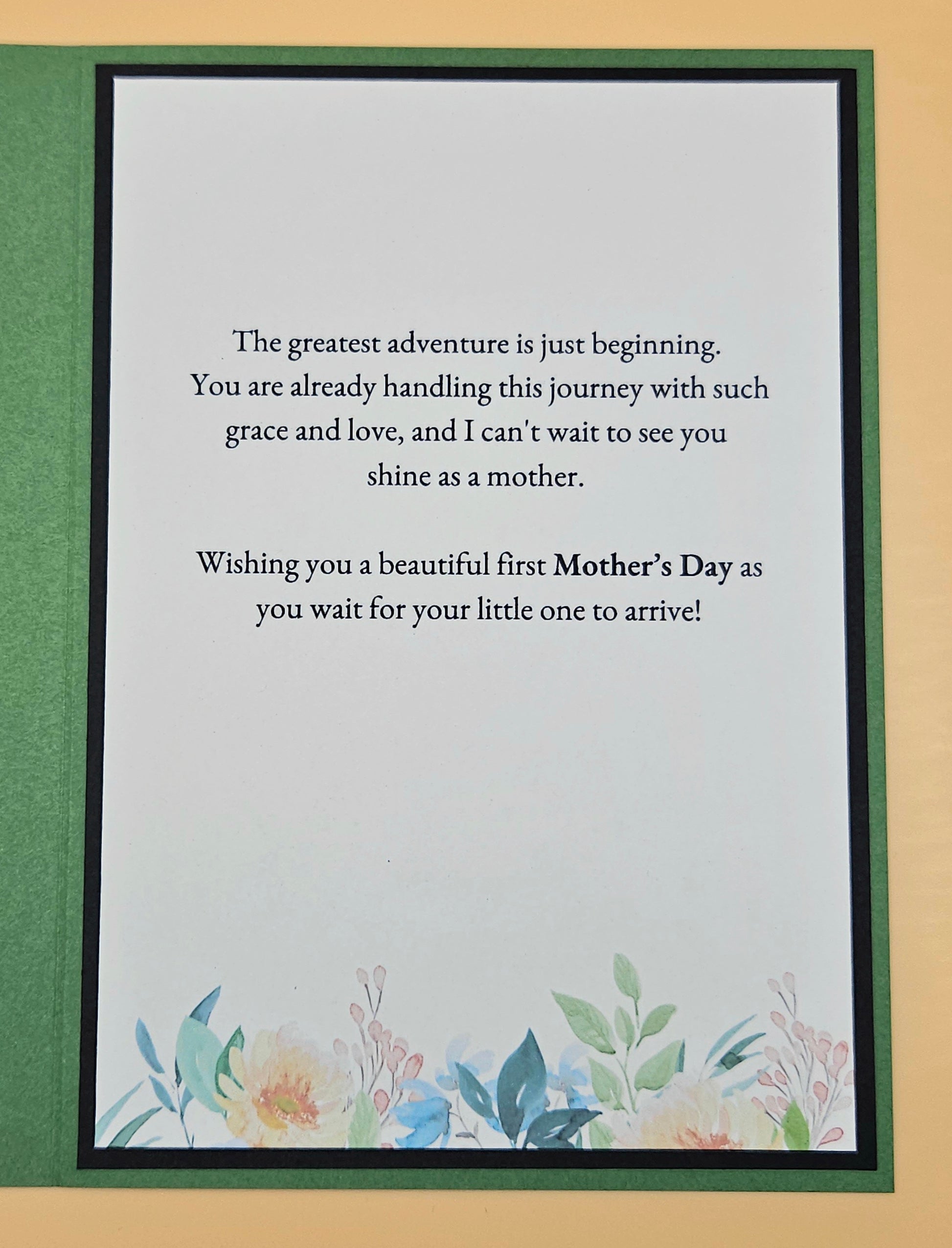 Greeting card with a message for a first-time mother on a floral background