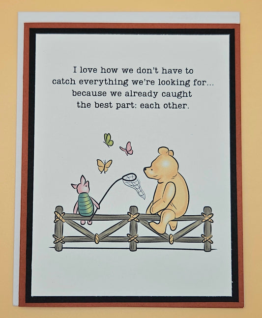 Illustration of a bear and a piglet sitting on a fence with butterflies, framed text on a beige background.