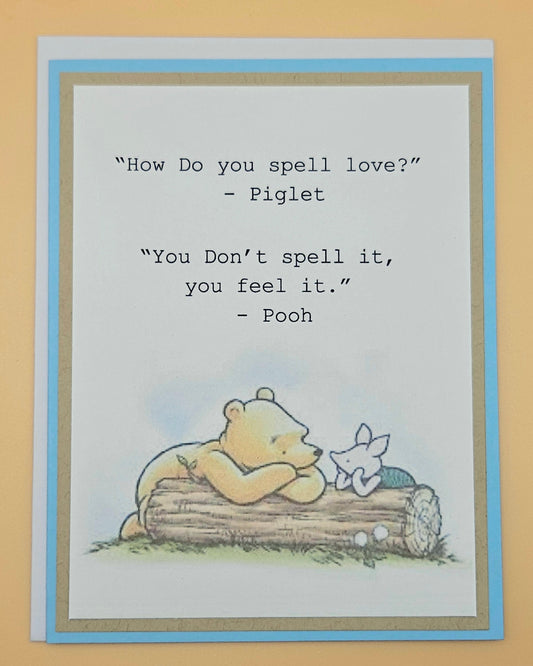 Card with Winnie the Pooh and Piglet sitting on a log, featuring a quote between them.