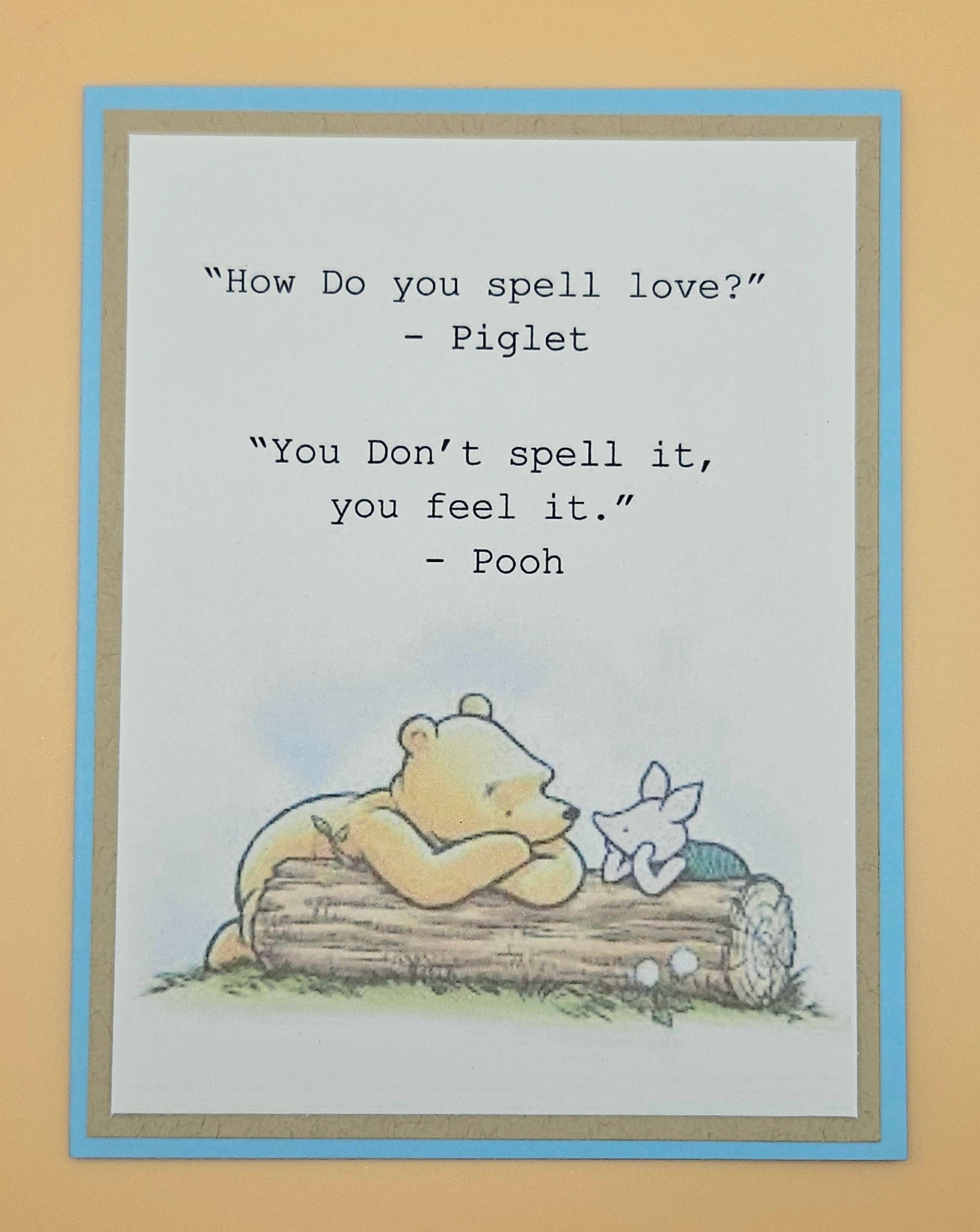 Cartoon of Pooh and Piglet on a log with a quote about love.