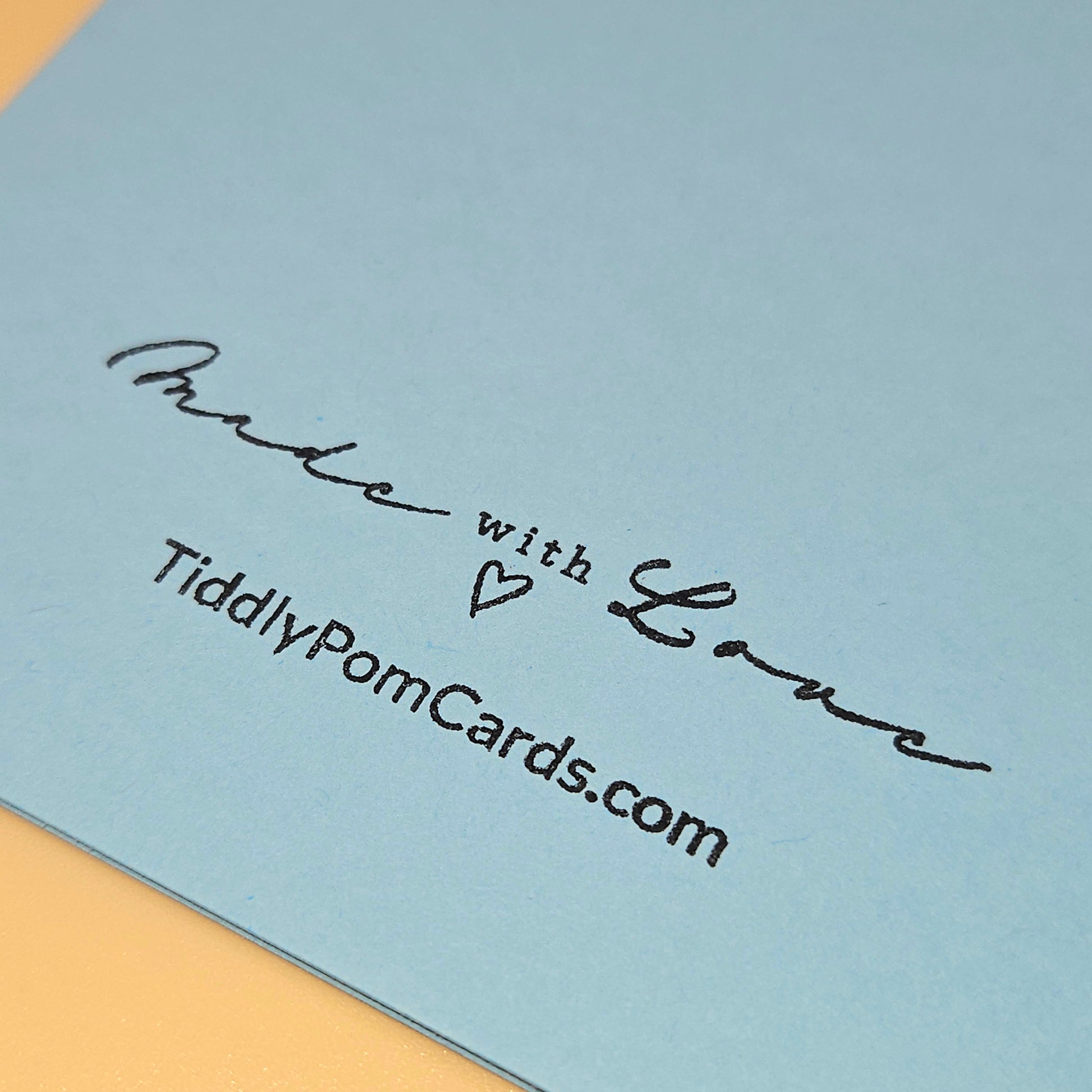 Card with 'Made with Love' text and TiddlyPomCards.com on a light blue background