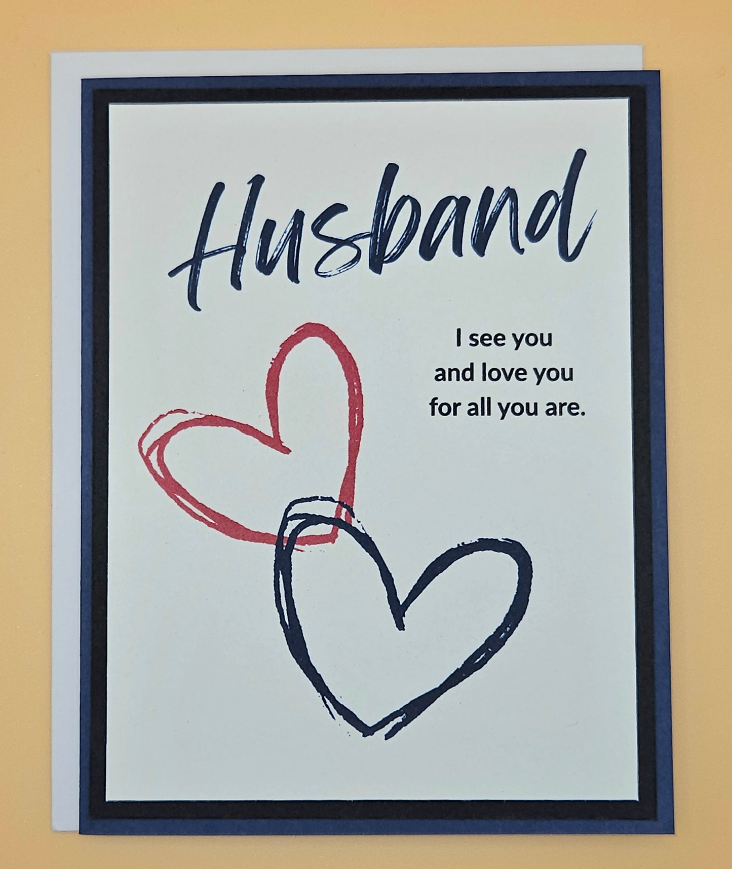 Greeting card for husband with hearts and text on a beige background