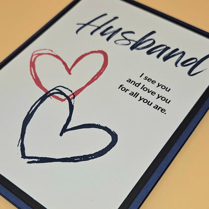 Card for a husband with heart drawings and text on a light background