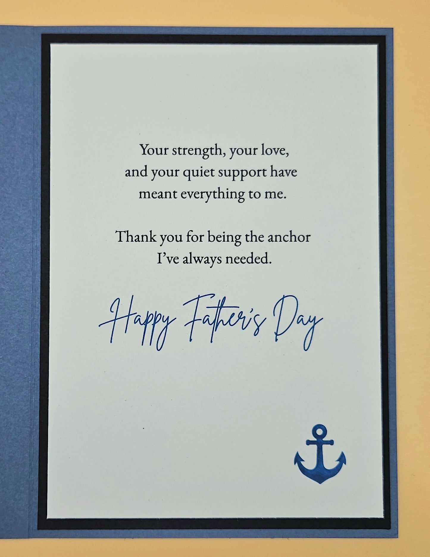 Father's Day card with a message and anchor symbol on a blue background