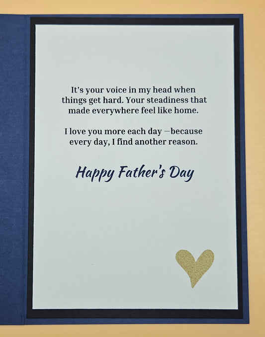 Father's Day card with a heartfelt message and gold heart on a blue border.
