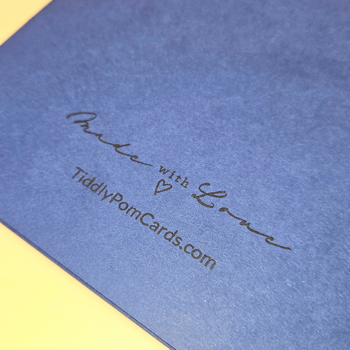 Blue card with 'Made with Love' and TiddlyPomCards.com text on a yellow background