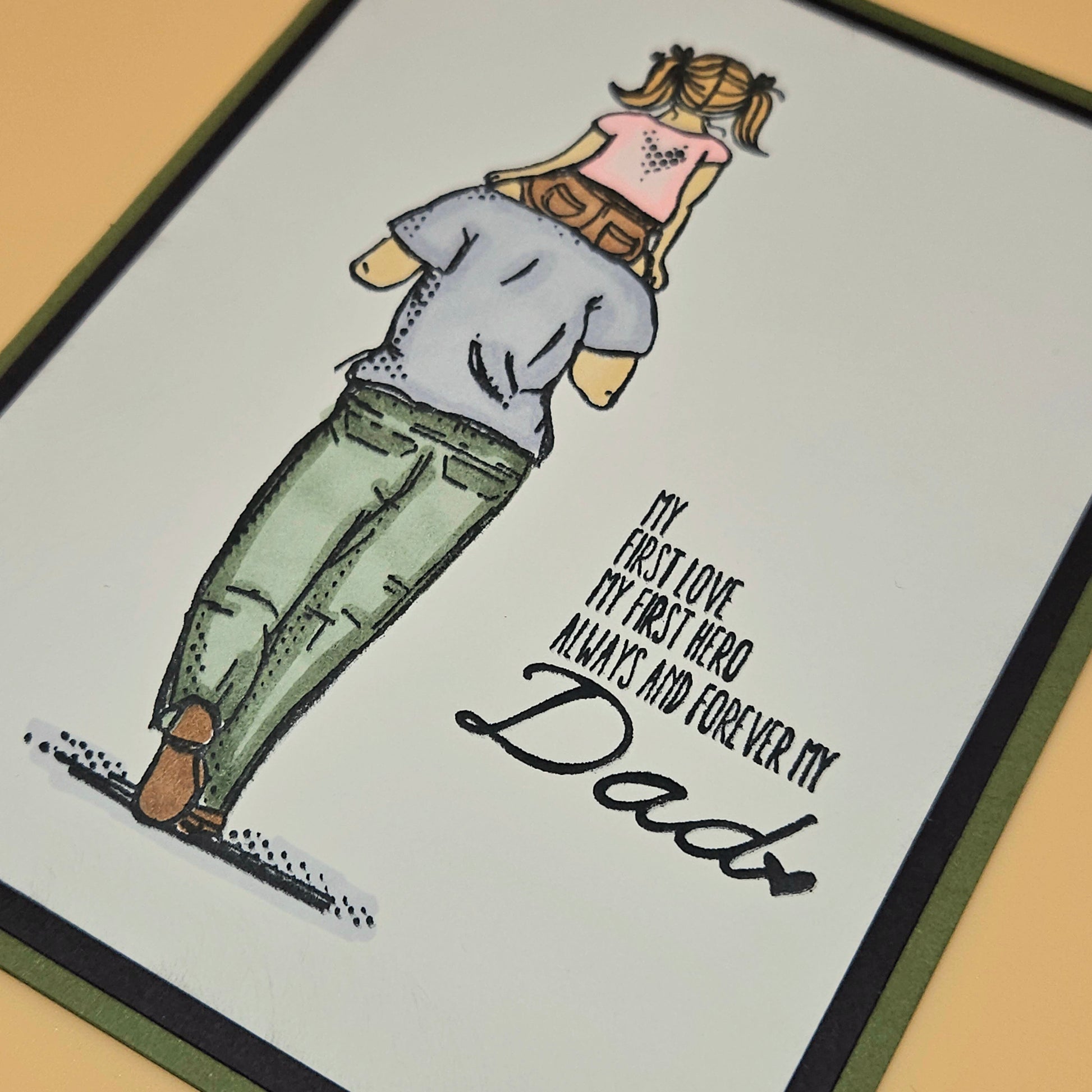Card with illustration of a woman hugging a man and text 'My first love, my first hero, always and forever my Dad' on a light gray background.