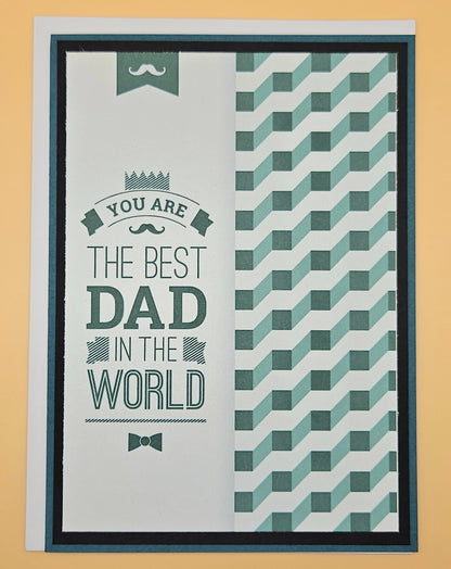 Greeting card with text 'You are the best dad in the world' and geometric pattern on a beige background