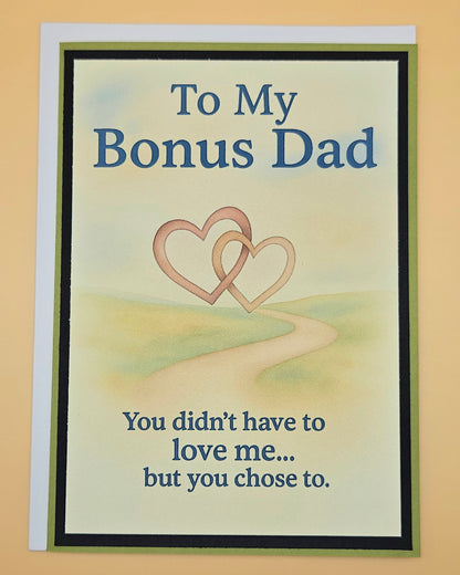 Greeting card for a bonus dad with two interlocking hearts and text on a beige background
