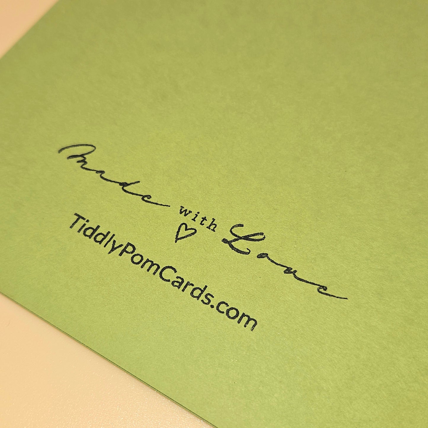 Green card with 'Made with Love' text and TiddlyPomCards.com on a beige background
