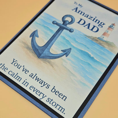 Card with anchor and lighthouse design, text 'To My Amazing DAD You've always been the calm in every storm.'