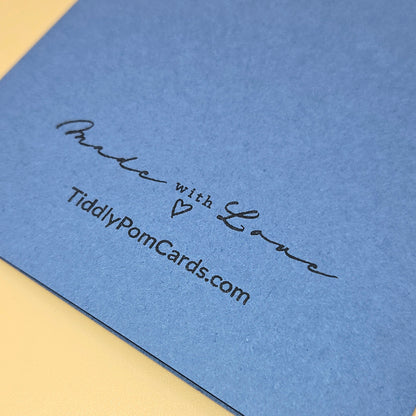Blue card with 'Made with Love' text and website URL on a yellow background