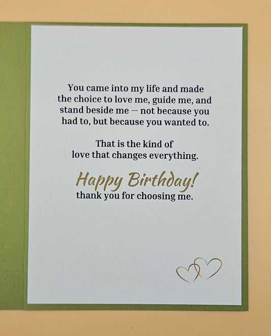 Birthday card with romantic message and two hearts on a beige background