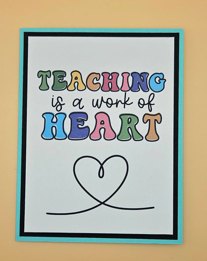Poster with 'Teaching is a work of heart' text on a beige background