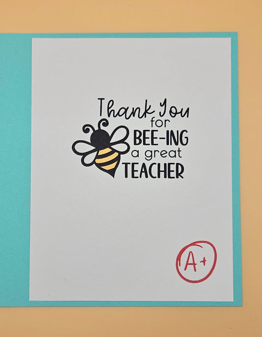Card with a bee illustration and text 'Thank you for BEING a great teacher' on a light blue border.