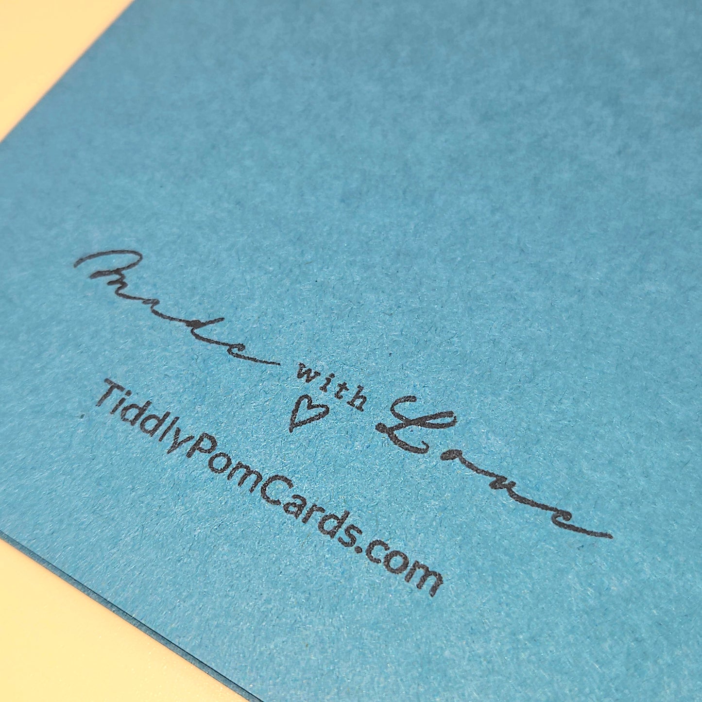 Blue card with 'Made with Love' text and TiddlyPomCards.com on a yellow background