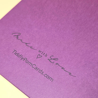 Purple card with 'Made with Love' text and website URL on a matching purple background