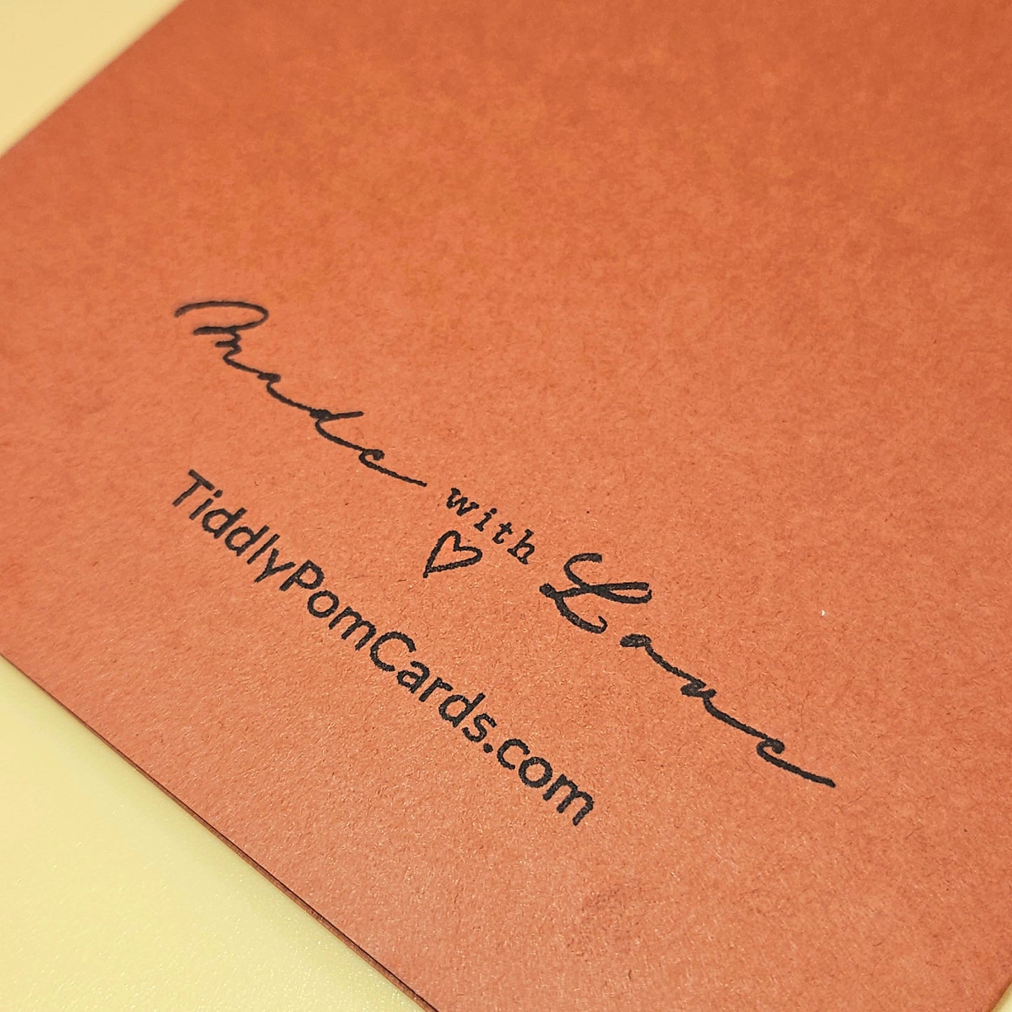 Brown card with 'Made with Love' and TiddlyPomCards.com text