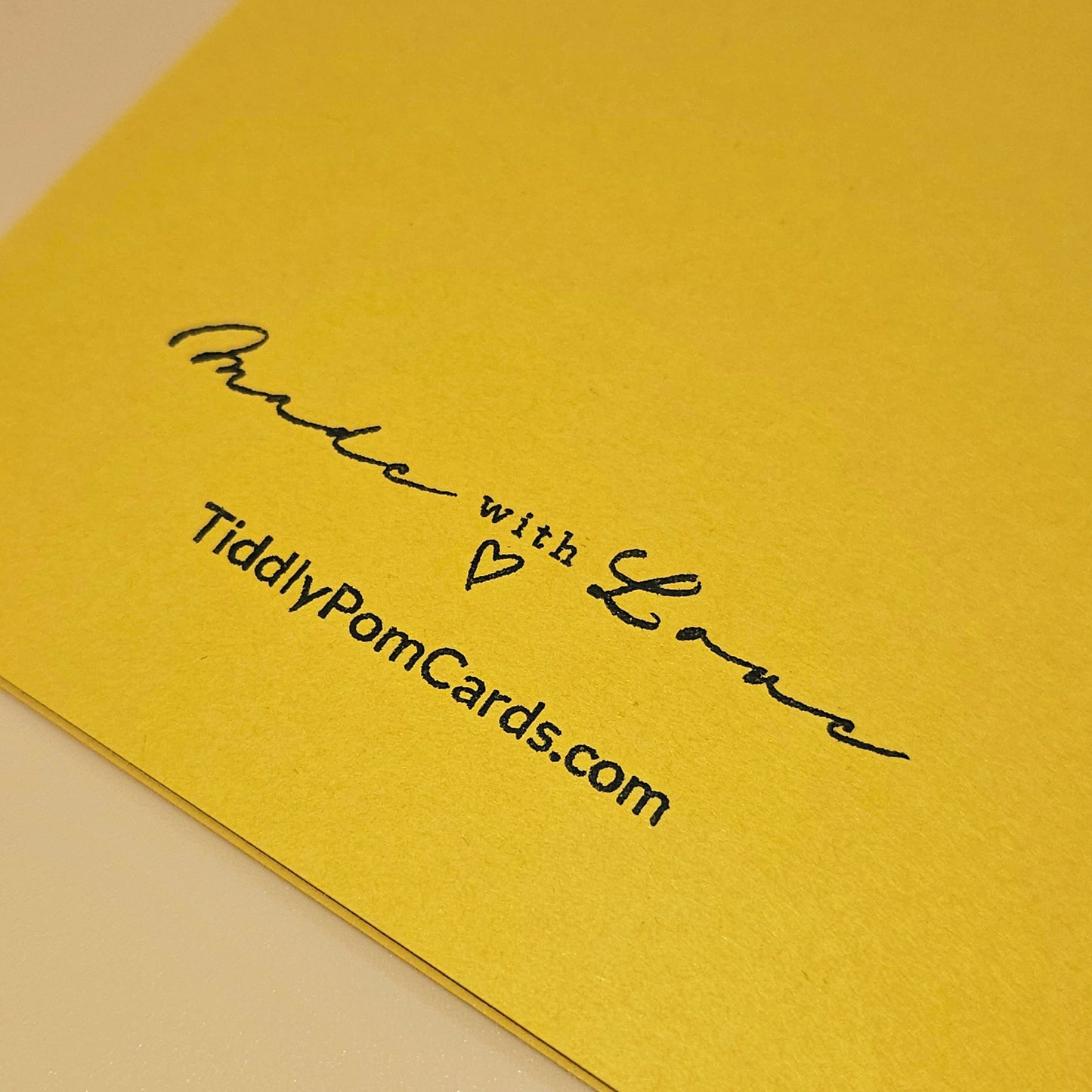 Yellow card with 'Made with Love' and TiddlyPomCards.com text
