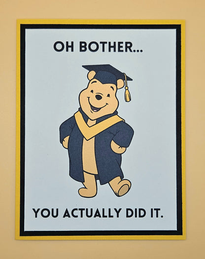 Cartoon bear in graduation attire with text on a beige background