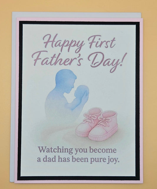 First Father's Day card for new dad with baby girl, watercolor dad cradling newborn silhouette, soft pink peach border A2 keepsake