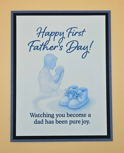 Father's Day card with silhouette of a father and baby shoes, text 'Happy First Father's Day! Watching you become a dad has been pure joy.'.