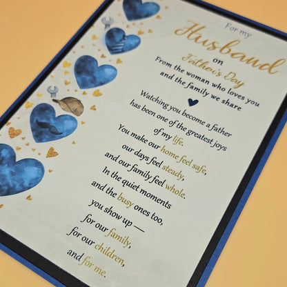Father's Day card for husband close up showing blue heart column with dad icons and gold mini hearts