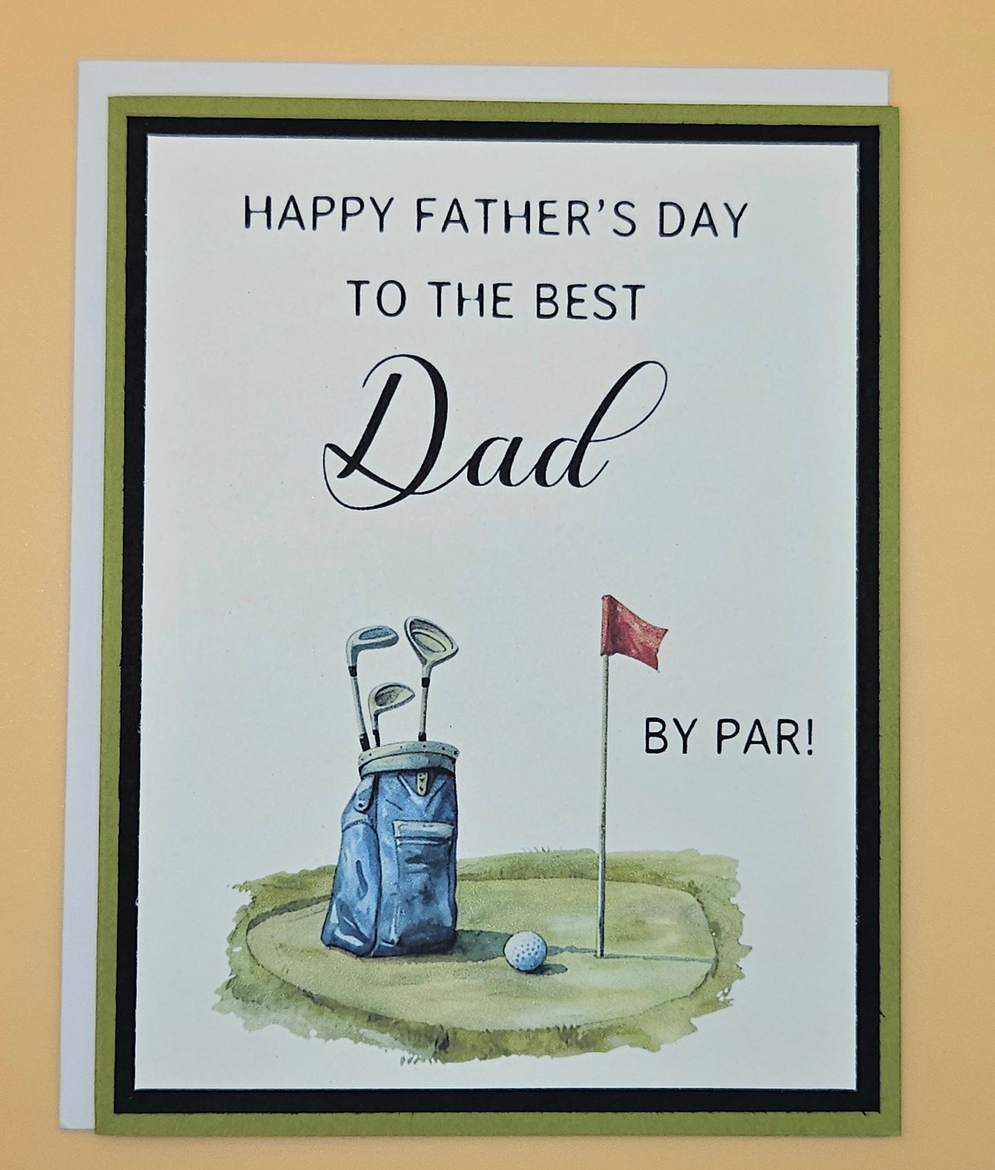Handmade Father's Day golf card with watercolor golf bag, ball, and flag on sage green and black layered cardstock, A2 keepsake