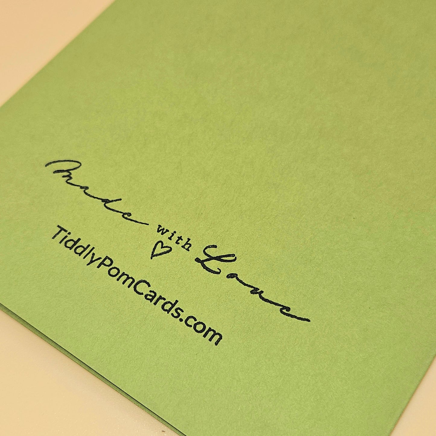 Green card with 'Made with Love' text and TiddlyPomCards.com on a beige background