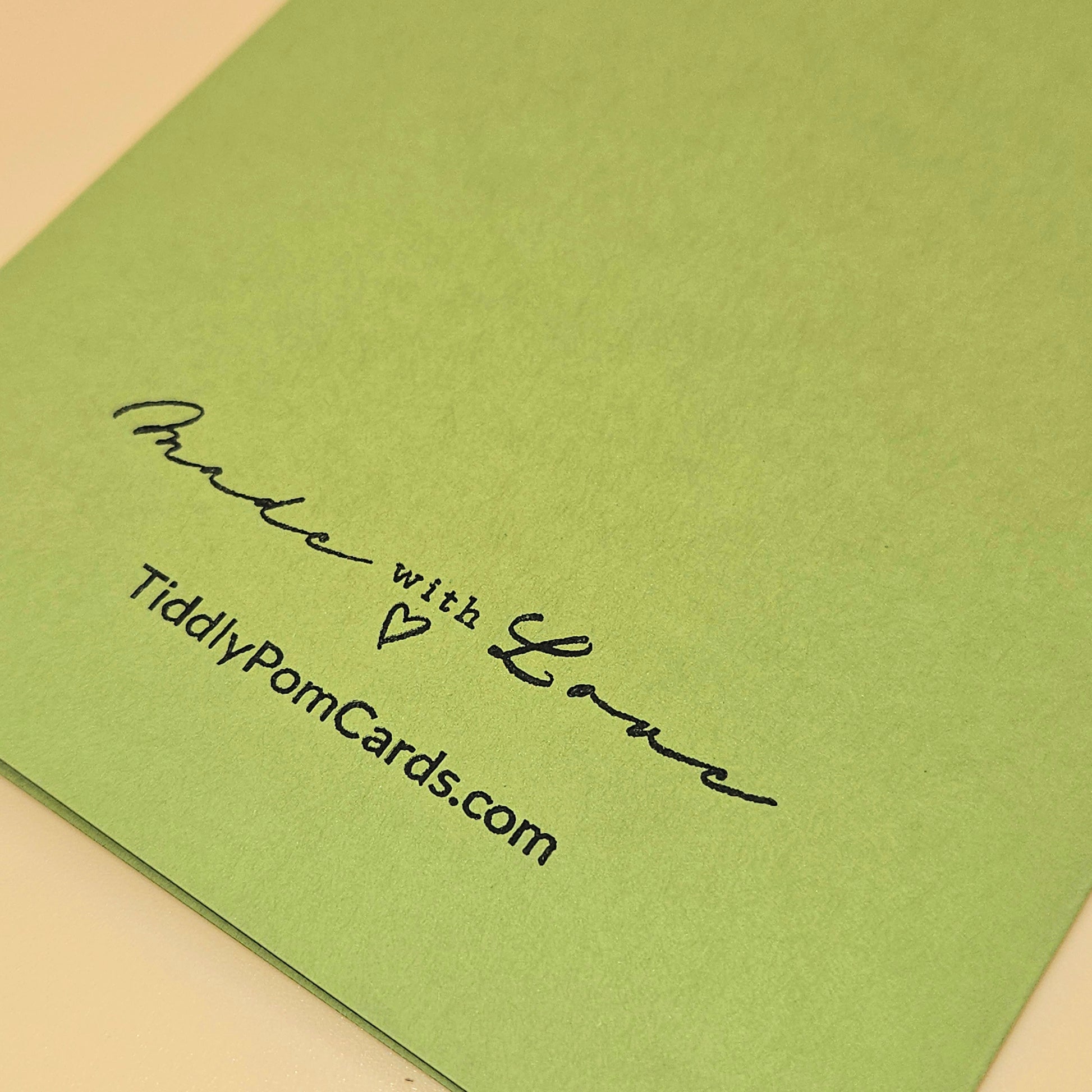 Green card with 'Made with Love' text and TiddlyPomCards.com on a beige background