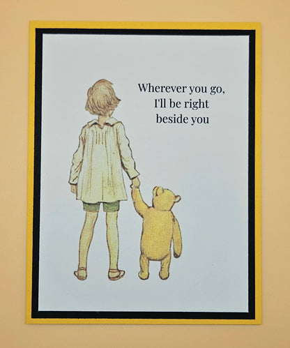 Handmade Winnie the Pooh friendship card featuring classic Christopher Robin and Pooh walking hand in hand illustration with warm yellow and black layered cardstock frames
