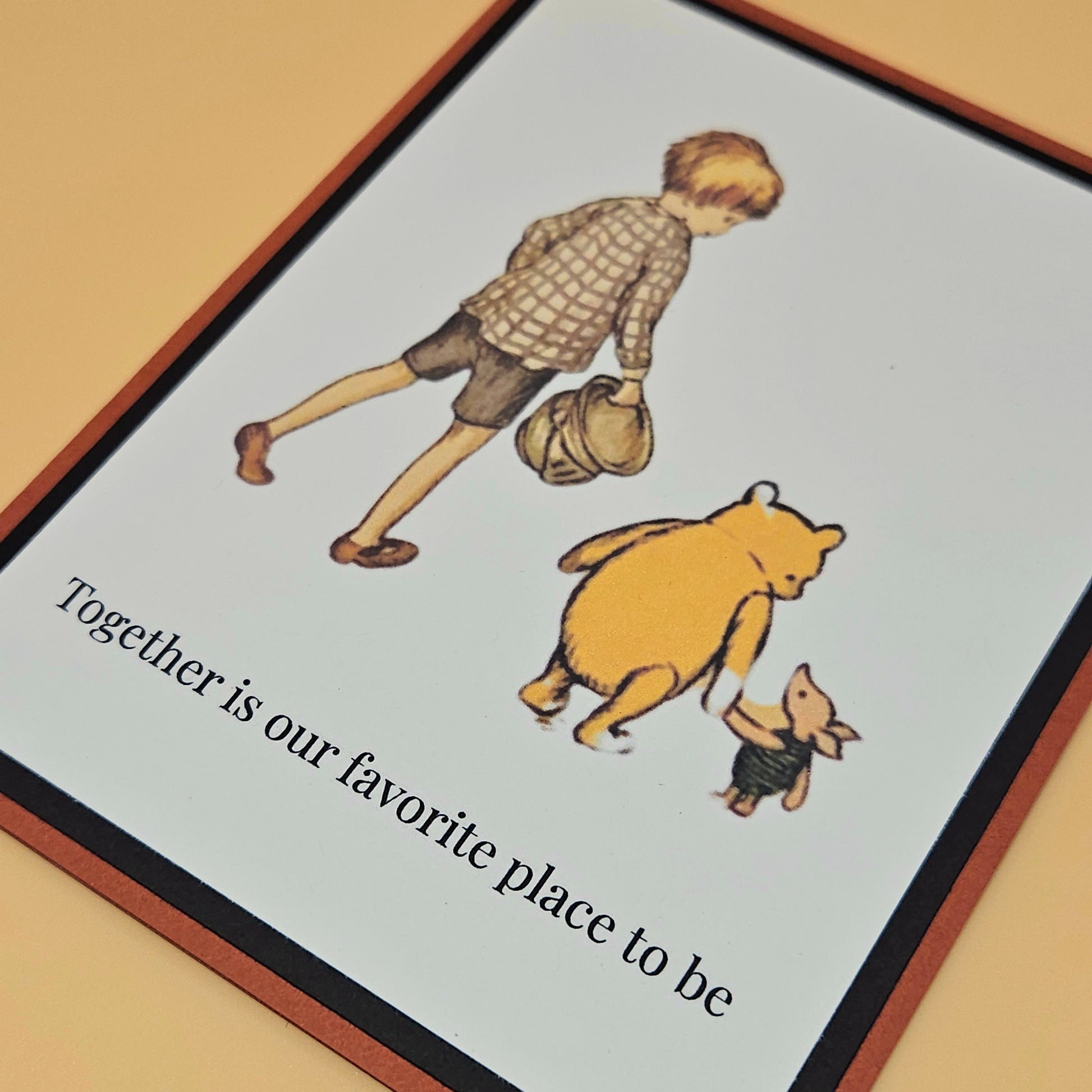 Illustration of a boy with a bear and a piglet, with text 'Together is our favorite place to be' on a framed background.