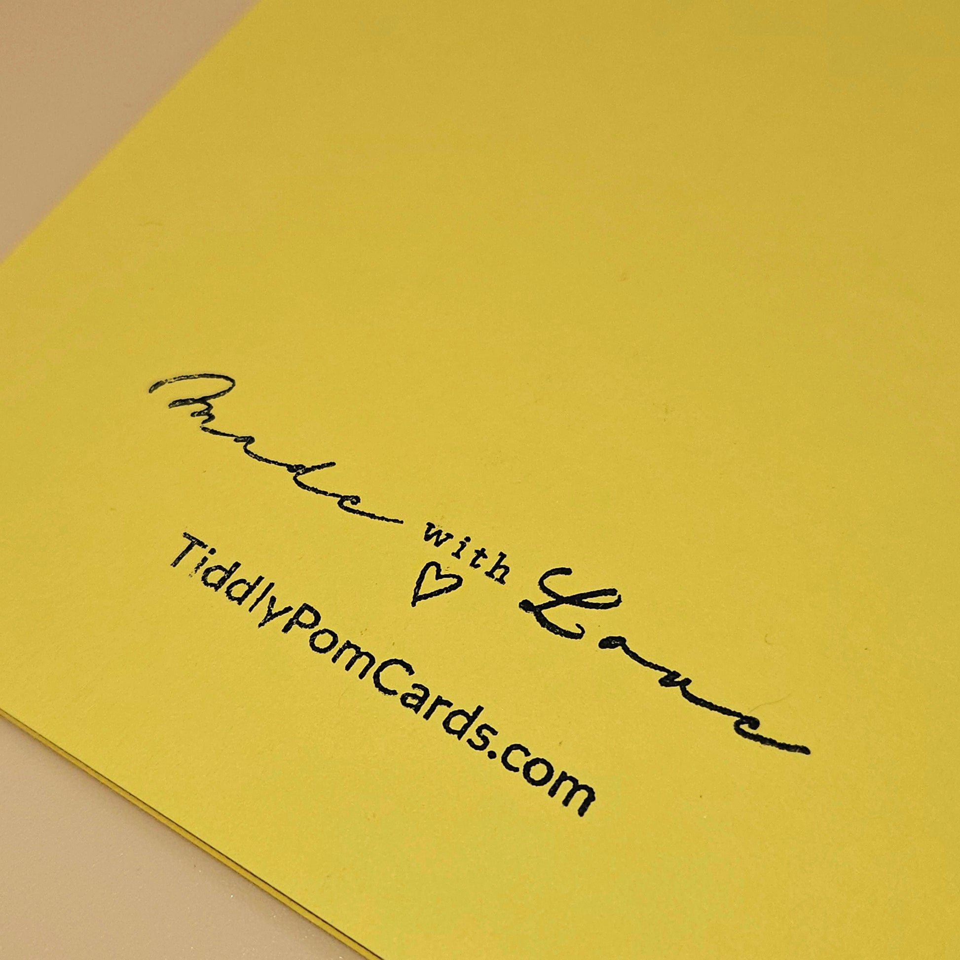 Yellow card with 'Made with Love' text and TiddlyPomCards.com on a beige background
