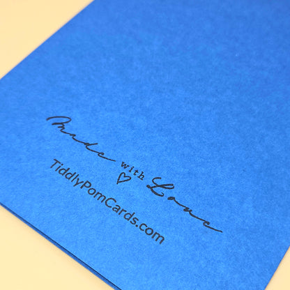 Blue card with 'Made with Love' text and tiddlypomcards.com on a beige background