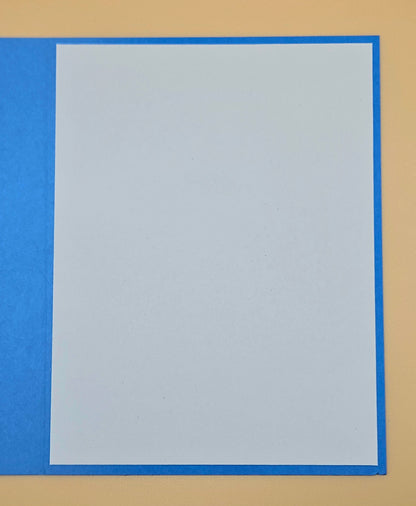 Rectangular gray card with blue border on a beige background