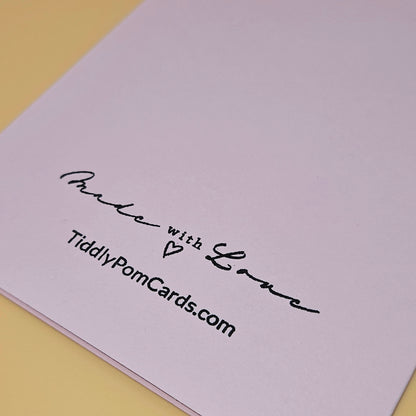 Greeting card with 'Made with Love' text and TiddlyPomCards.com on a light purple background