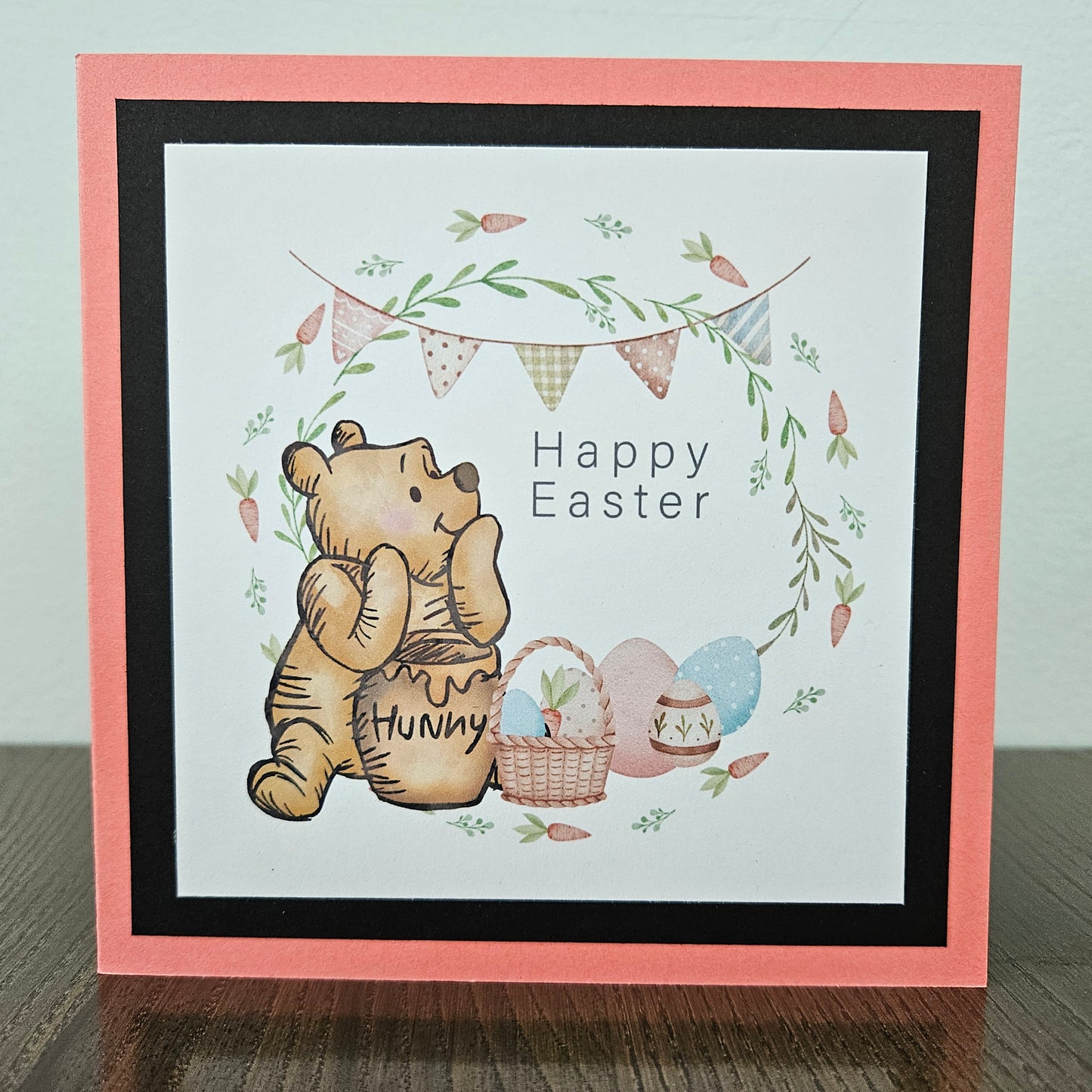 Greeting card with Winnie the Pooh and Easter elements on a beige background