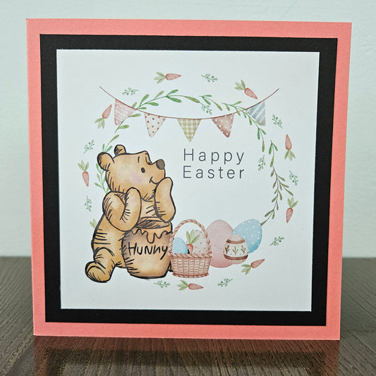 Greeting card with Winnie the Pooh and Easter elements on a beige background