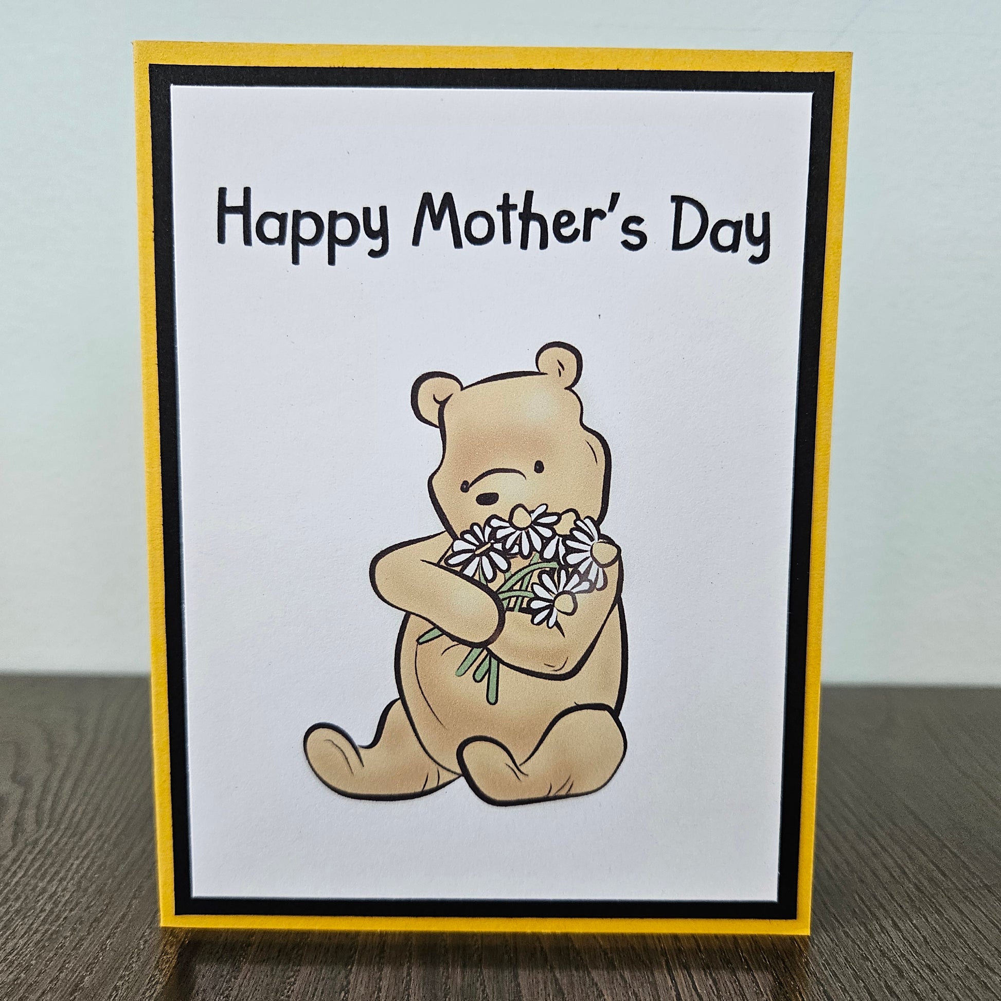 Mother's Day card with a bear holding flowers on a beige background