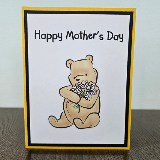 Mother's Day card with a bear holding flowers on a beige background