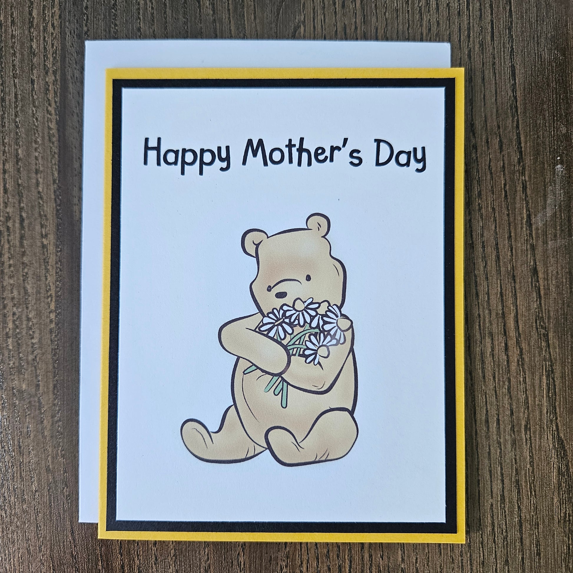 Mother's Day card with a bear holding flowers on a beige background