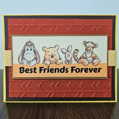 Card with cartoon characters and 'Best Friends Forever' text on a textured red background
