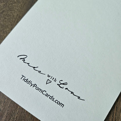 White card with 'Made with Love' and 'TiddlyPomCards.com' text on a wooden surface