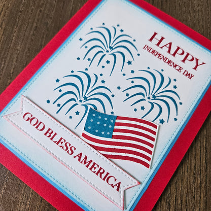 Card with American flag and fireworks design, text 'Happy Independence Day' and 'God Bless America'.