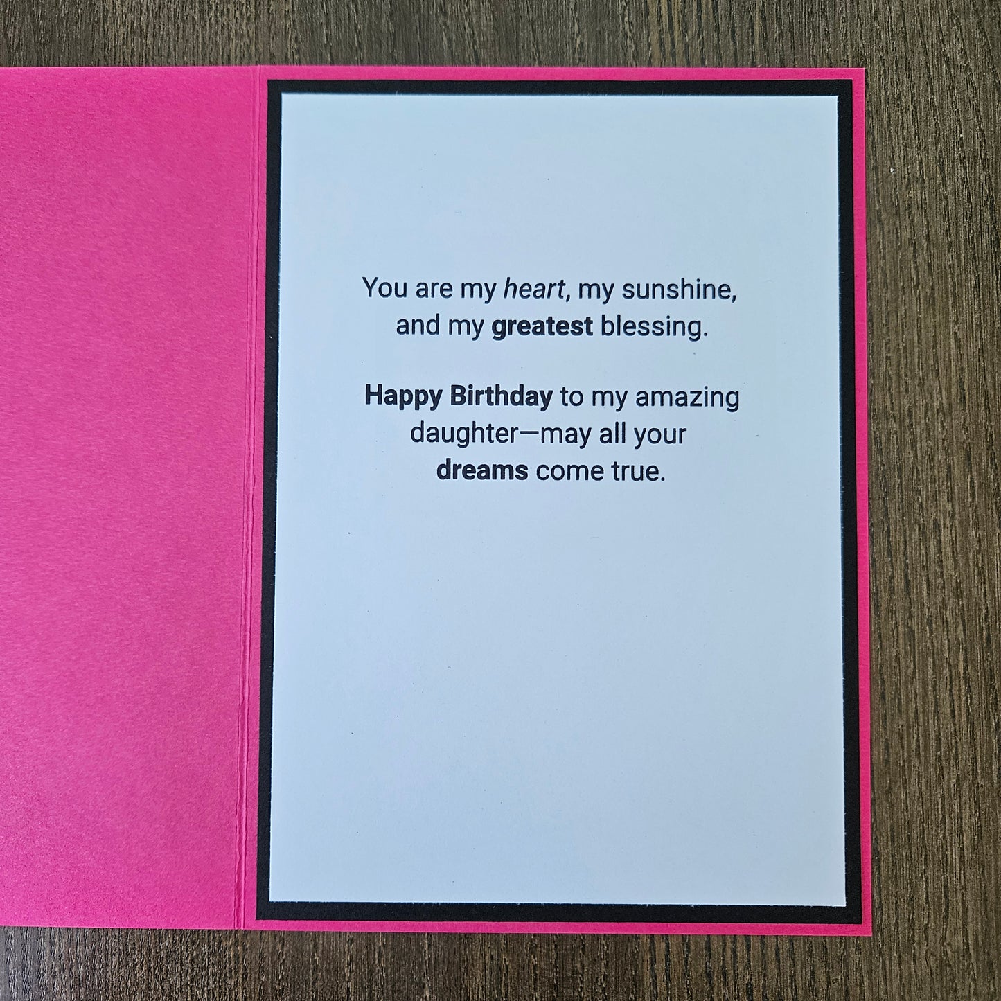a handmade 5x7 birthday card featuring a vibrant watercolor floral split panel design and printed heartfelt sentiments, finished with a crisp black mat and bright pink cardstock frame. Tiddly Pom Cards