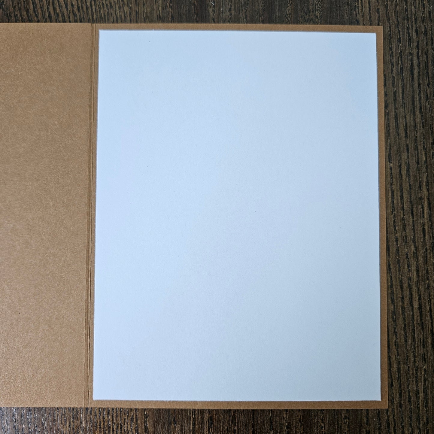 a handmade A2 birthday card featuring a sepia-toned vintage world map background pattern and a raised cream-colored stitched diamond layer that reads Happy Birthday Grandpa, finished with a sharp black mat and kraft brown cardstock frame.