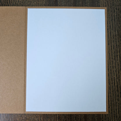 a handmade A2 birthday card featuring a sepia-toned vintage world map background pattern and a raised cream-colored stitched diamond layer that reads Happy Birthday Grandpa, finished with a sharp black mat and kraft brown cardstock frame.
