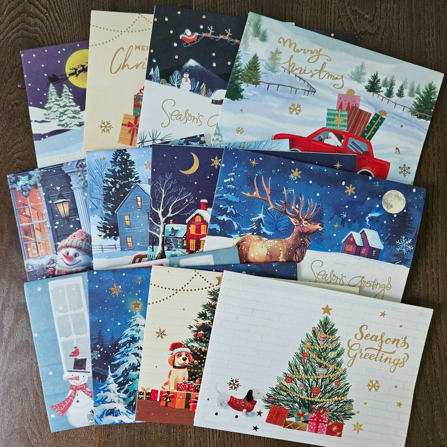 Set of 12 colorful 5x7 3D pop-up Christmas cards featuring festive holiday designs with built-in interior gift card holders and coordinating envelopes.